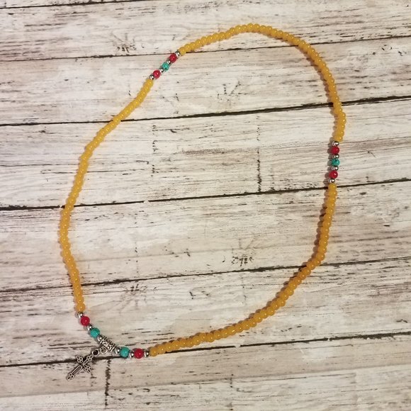 Yellow stretchy bracelet with cross charm - Picture 2 of 5